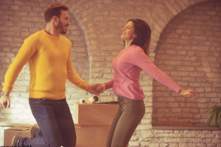 happy jumping couple